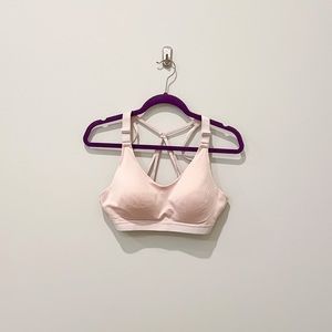 Calia by Carrie Underwood light pink sports bra